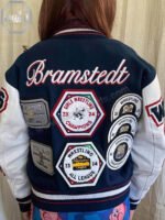 Internal view of the quilted thermal lining and private label branding inside a New Jersey custom varsity jacket.