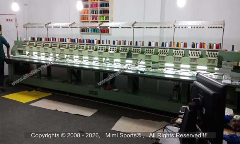 High-density custom embroidery on a performance polo shirt showing 3D puff stitching and fine detail by MimiSports USA.