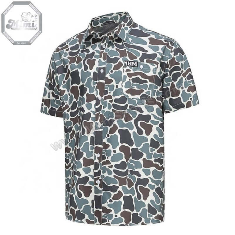 Technical view of MimiSports USA camo shirt showing a high-stitch-count embroidery logo for a premium 3D brand finish.